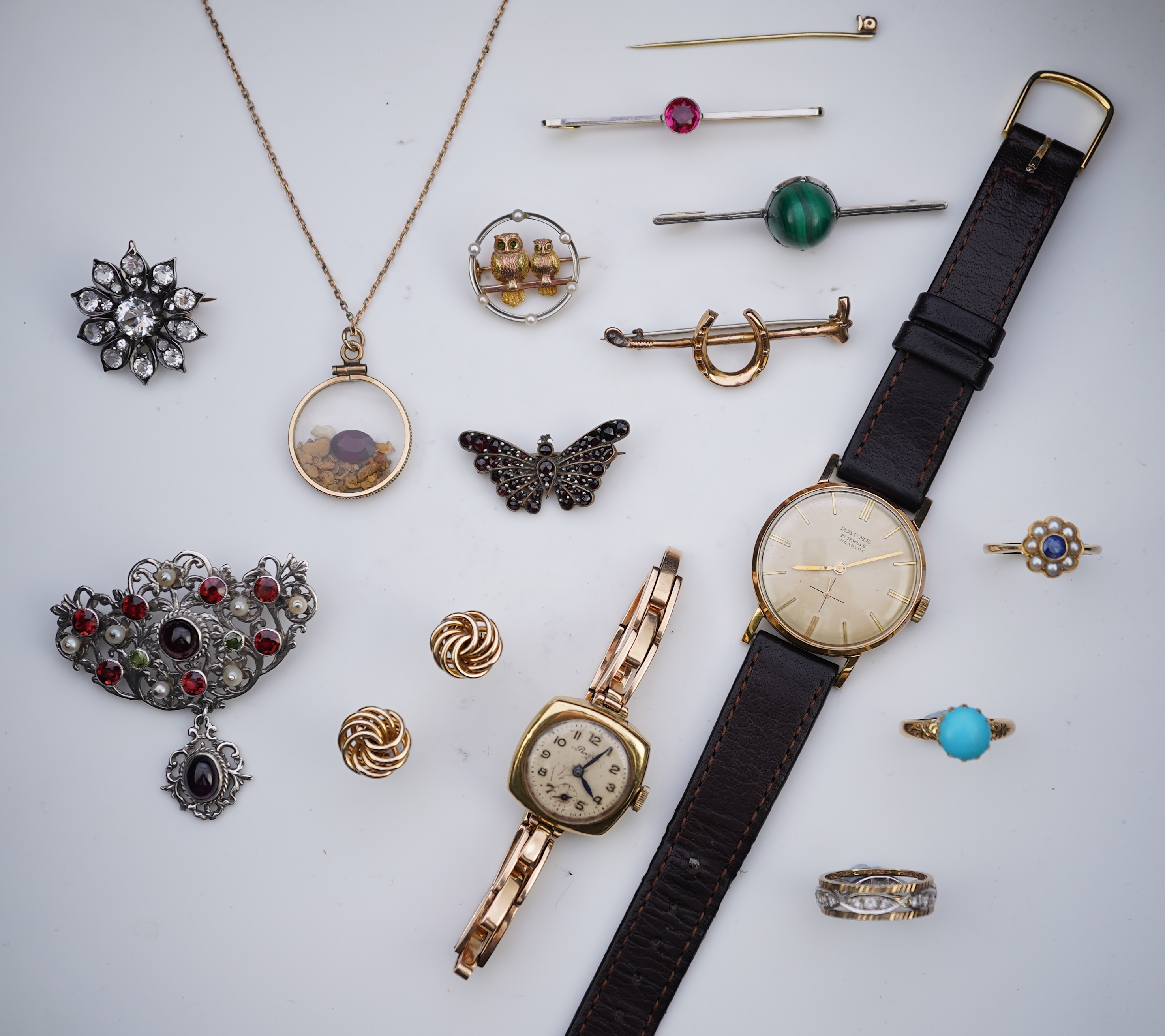A group of jewellery and two watches